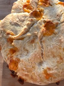 Cheddar Artisan Bread -- Crispy on the outside, soft on the inside, this Cheddar Artisan Bread may be the easiest most amazing bread you've ever had. No kneading needed! |thatwhichnourishes.com