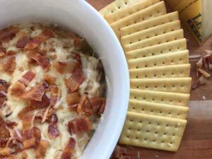 Caramelized Onion Dip with Bacon and Gruyere -- How can you go wrong with caramelized onions, bacon, and gruyere mixed into a savory cream cheese based dip everyone will drool over! | thatwhichnourishes.com
