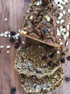Pumpkin Oat Bread with Raisins -- All the goodness you crave in a pumpkin bread without all of the ingredients you don't. Loaded with oats, raisins, and spices, this is out go-to, good choice, fruit bread good for every season. | thatwhichnourishes.com