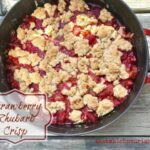 Strawberry Rhubarb Crisp -- Strawberries and rhubarb get married and make a delicious combination of sweet and tart under a crispy blanket of buttery oats and brown sugar. | thatwhichnourishes.com