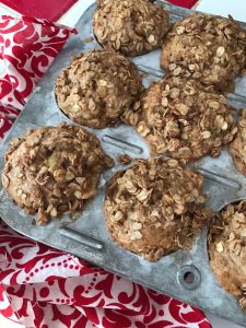 Banana Oatmeal Streusel Muffins -- soft and flavorful banana muffins packed with oatmeal and spice and blanketed by a sweet, crumbly streusel topping made with oats, butter, and brown sugar. | thatwhichnourishes.com