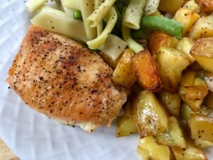 One Pan Crispy Chicken and Potatoes -- The easiest and best thing you've eaten lately and it's made on one pan with less than five ingredients. Crispy, juicy chicken and tender potatoes with crisp edges packed with flavor and goodness. Nourishment at its simplest and finest. | thatwhichnourishes.com