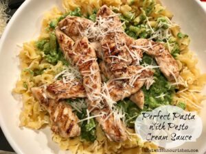 Perfect Pasta with Pesto Cream Sauce -- Grilled chicken, and freshly made pesto are tossed into pasta with a bit of butter and cream to make a fast and easy nourishing meal. | thatwhichnourishes.com
