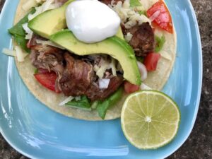 Pork Carnitas -- Packed with flavor, this is the way you make perfect pork for pork tacos. Try it once. You might forget about beef. |thatwhichnourishes.com