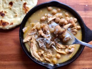 Mulligatawny Soup -- Mulligatawny Soup is a rich and intensely flavorful soup that combines warm and exotic spices with creamy coconut milk, chicken, and chickpeas to make a feast for your senses. | thatwhichnourishes.com