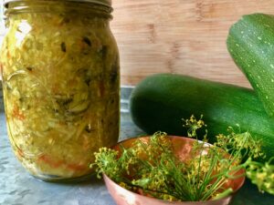 Mustard Garden Relish -- Cucumbers, zucchini, onion and pepper come together in a mild relish that has a mild mustard flavor and makes the BEST addition to your BBQ sandwiches, hot dogs, sandwiches, and even tuna salad! | thatwhichnourishes.com
