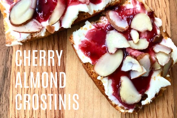 Cherry Almond Crostinis -- Tiny toast layered with flavors of sweet and savory. Cream cheese, sweet and spicy jam, and crunchy almonds make an appealing appetizer that tastes even better than it looks! | thatwhichnourishes.com