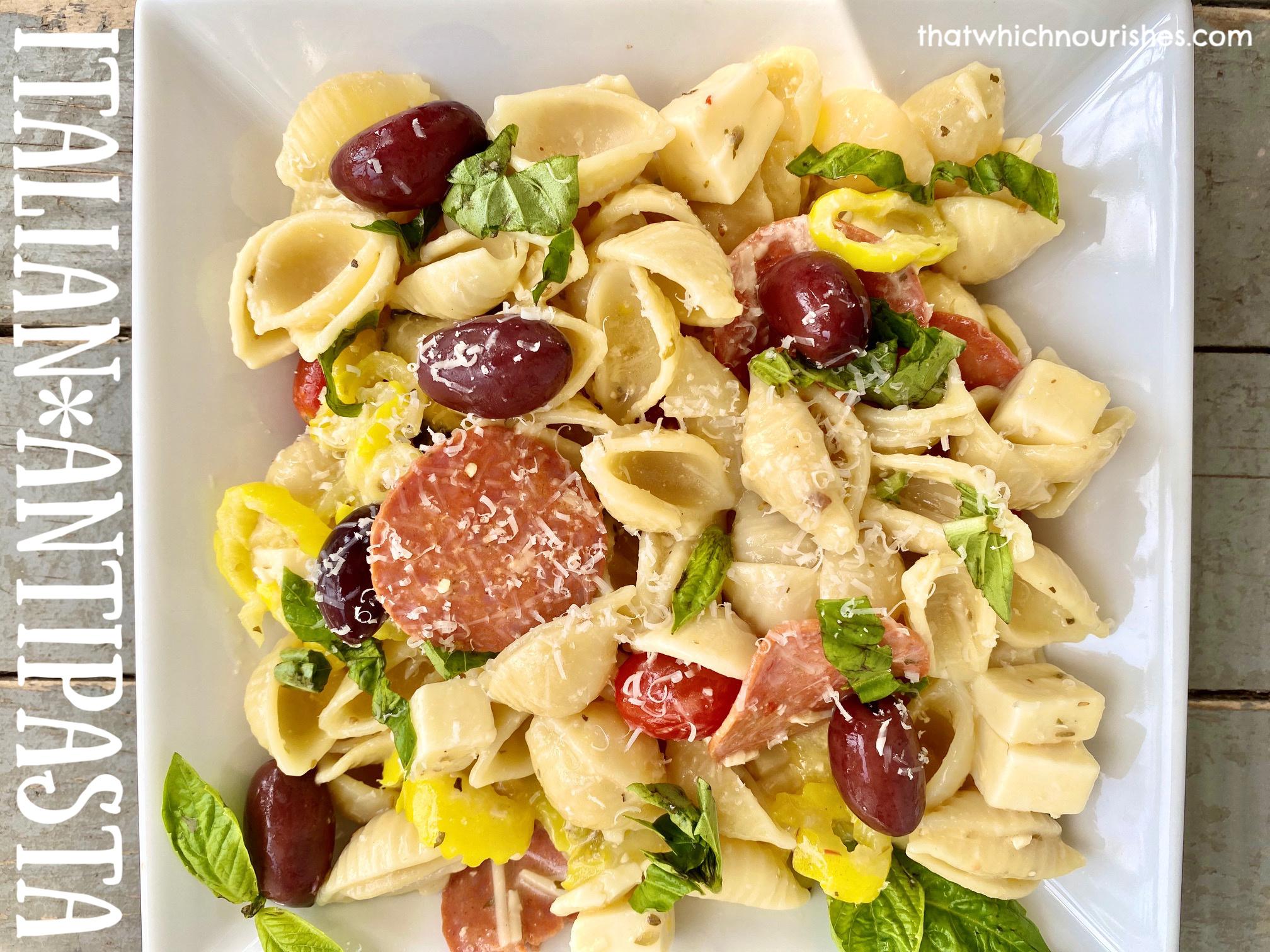 Italian Antipasta -- because it's all of the spicy flavors you love in an Italian salad wrapped into one Antipasto pasta! | thatwhichnourishes.com