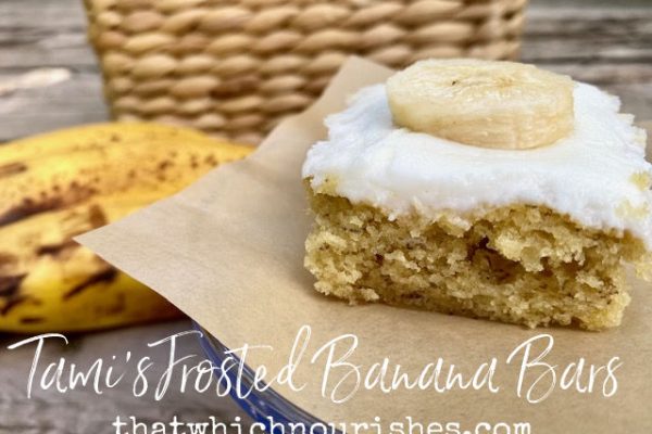 Tami's Frosted Banana Bars -- Soft and moist banana cake frosted with a simple yet decadent vanilla frosting. I dare you to try and eat just one! | thatwhichnourishes.com